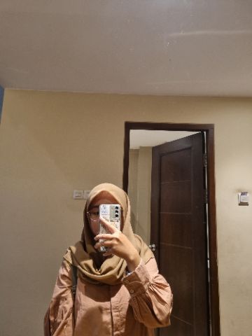SHELA OKTAFIANA